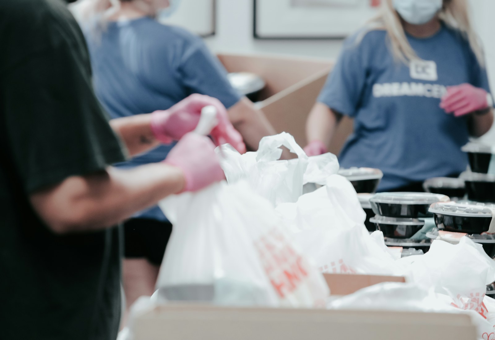 Volunteers preparing meals for community distribution.